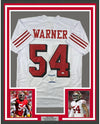Framed Autographed/Signed Fred Warner 35x39 San Francisco White Alternate Football Jersey Beckett BAS COA