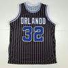 Autographed/Signed Shaquille Shaq O'Neal Orlando Black Pinstripe Basketball Jersey JSA COA