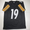 Autographed/Signed JuJu Smith-Schuster Pittsburgh Black Football Jersey Beckett BAS COA
