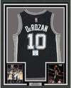 Framed Autographed/Signed DeMar DeRozan 35x39 San Antonio Black Basketball Jersey Beckett BAS COA