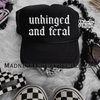 Unhinged and feral Trucker Hat by Madness & Mayhem LLC