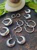 RIVETED MOON HOOPS by Bellaforma Jewelry