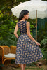 Moth Midi Dress by Retrolicious