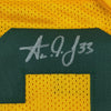 Framed Autographed/Signed Aaron Jones 35x39 Green Bay Yellow Football Jersey Beckett BAS COA