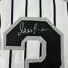 Framed Autographed/Signed Ozzie Guillen 35x39 Chicago Pinstripe Baseball Jersey JSA COA