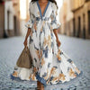 Women's Floral Print Maxi Dress With Deep V-Neck & Flare Sleeves