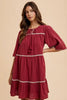 Tassel Contrast Trim Tie Neck Half Sleeve Tiered Dress – Bohemian-Inspired Dress with Tassel Details, Adjustable Tie Neck, and Tiered Design for a Flowing, Feminine Silhouette by Stevvex