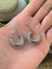 RIVETED MOON HOOPS by Bellaforma Jewelry
