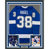 Framed Autographed/Signed Brandon Hagel 35x39 Tampa Bay Blue Hockey Jersey JSA COA by Hall of Fame Sports Memorabilia