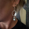 White Buffalo Turquoise Hoop Earrings in Sterling Silver with Hand-Sawn Cactus Design by mend metalworks