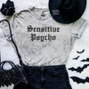 Sensitive psycho embroidered color blast tshirt by Madness & Mayhem LLC