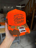 Hotter Than A Hoochie Coochie Trucker Hat by Luckless Outfitters