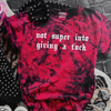 Not into giving a fuck embroidered tie dye T-shirt by Madness & Mayhem LLC