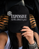 Expensive embroidered Trucker Hat by Madness & Mayhem LLC