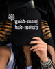 Good mom bad mouth embroidered Trucker Hat by Madness & Mayhem LLC