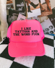Neon pink tattoos & the word fuck embroidered Trucker Hat by Madness & Mayhem LLC