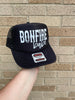 Black bonfire babe Trucker Hat by Madness & Mayhem LLC