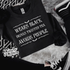 Wears black twisted tea crew neck sweatshirt (finished product) by Madness & Mayhem LLC