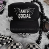 White anti social bat Trucker Hat by Madness & Mayhem LLC