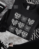 Checkered heart grid sweatshirt by Madness & Mayhem LLC