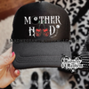 Motherhood roll with it Trucker Hat by Madness & Mayhem LLC