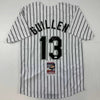 Autographed/Signed Ozzie Guillen Chicago Pinstripe Baseball Jersey JSA COA by Hall of Fame Sports Memorabilia