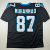 Autographed/Signed Muhsin Muhammad Carolina Black Football Jersey Beckett BAS COA