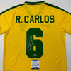 Autographed/Signed Roberto Carlos Brazil Yellow Retro Soccer Jersey Beckett BAS COA