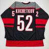 Autographed/Signed Pyotr Kochetkov Carolina Black Hockey Jersey JSA COA