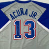 Autographed/Signed Ronald Acuna Jr. Atlanta Grey Retro Baseball Jersey Beckett BAS COA