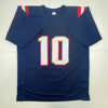 Autographed/Signed Mac Jones New England Blue Football Jersey Beckett BAS COA