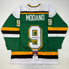 Autographed/Signed Mike Modano Minnesota Green Hockey Jersey Beckett BAS COA