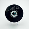 Autographed/Signed Macklin Celebrini San Jose Sharks Logo Hockey Puck Fanatics COA