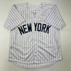 Autographed/Signed Johnny Damon New York Pinstripe Baseball Jersey Beckett BAS COA