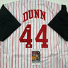 Autographed/Signed Adam Dunn Cincinnati Pinstripe Baseball Jersey JSA COA