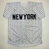 Autographed/Signed Oswald Peraza New York Pinstripe Baseball Jersey JSA COA