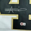Framed Autographed/Signed Alvin Kamara 35x39 New Orleans White Football Jersey Beckett BAS COA