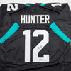 Autographed/Signed Travis Hunter Jacksonville Black Football Jersey Beckett BAS COA by Hall of Fame Sports Memorabilia