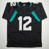 Autographed/Signed Travis Hunter Jacksonville Black Football Jersey Beckett BAS COA by Hall of Fame Sports Memorabilia