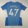 Autographed/Signed Phil Foden Manchester City Blue Soccer Futbol Jersey Beckett BAS COA