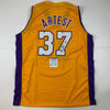 Autographed/Signed Ron Artest Los Angeles LA Yellow Basketball Jersey PSA/DNA COA