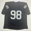 Autographed/Signed Maxx Crosby Las Vegas Oakland Black Football Jersey Beckett BAS COA