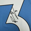 Framed Autographed/Signed Ruben Dias 35x39 Manchester City Blue Soccer Futbol Jersey Beckett BAS COA #2 by Hall of Fame Sports Memorabilia