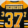 Autographed/Signed Patrice Bergeron Boston Black Hockey Jersey JSA COA