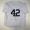 Autographed/Signed Mariano Rivera 1st Unanimous HOF New York Pinstripe Baseball Jersey Beckett BAS COA