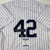 Autographed/Signed Mariano Rivera 1st Unanimous HOF New York Pinstripe Baseball Jersey Beckett BAS COA