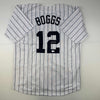 Autographed/Signed Wade Boggs New York Pinstripe Baseball Jersey Beckett BAS COA