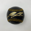 Autographed/Signed Ronald Acuna Jr. Black Rawlings Official Major League ROML Baseball JSA COA