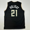 Autographed/Signed Jrue Holiday Milwaukee Black Basketball Jersey Beckett BAS COA