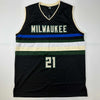 Autographed/Signed Jrue Holiday Milwaukee Black Basketball Jersey Beckett BAS COA